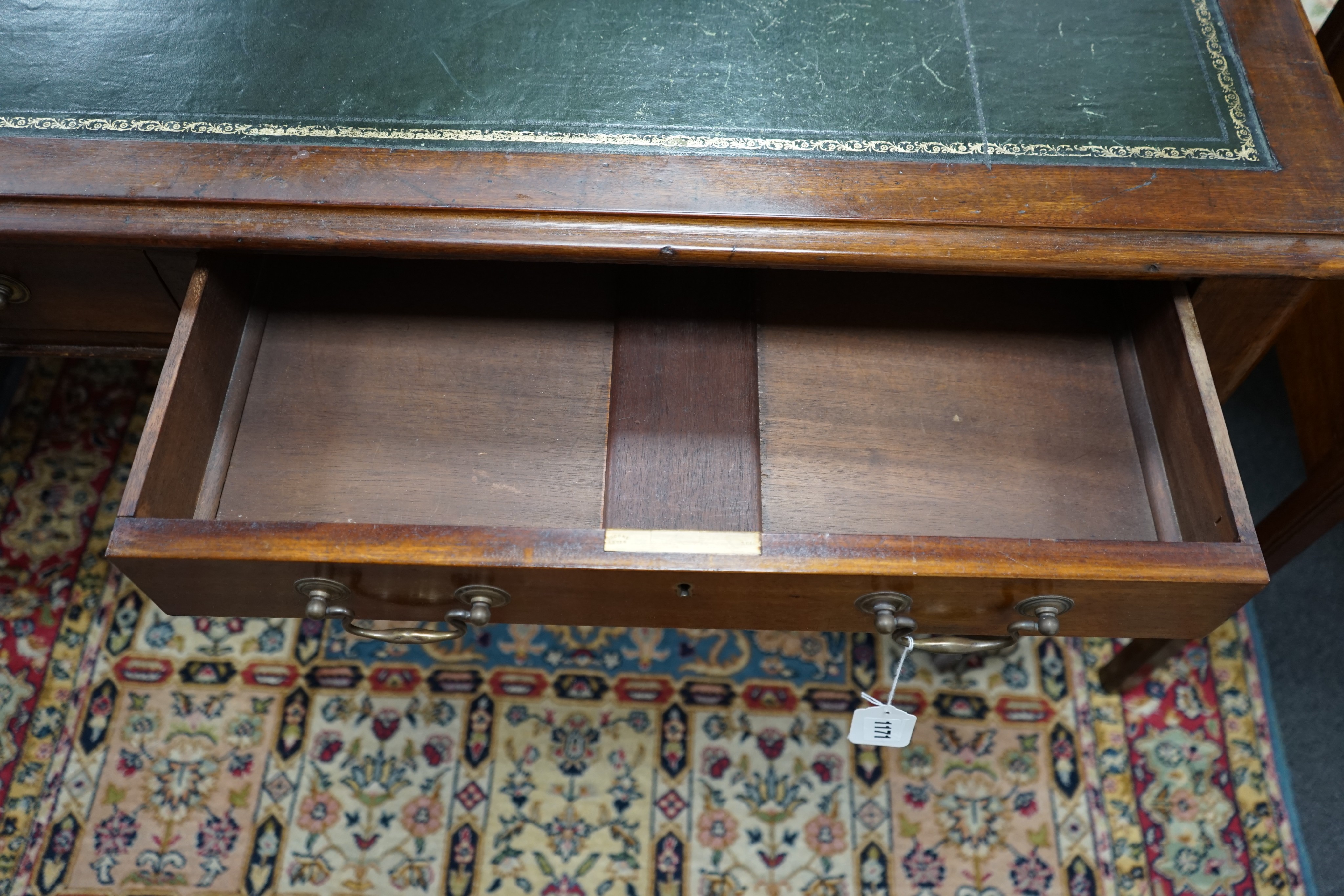 A Victorian mahogany two drawer library table, width 136cm, depth 74cm, height 74cm
